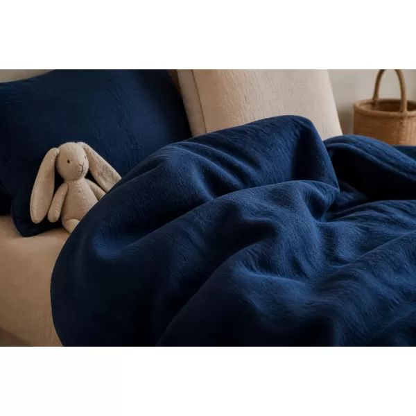 Brotex Mušelínové povlečení do dětské postýlky tmavě modré Zipový uzávěr